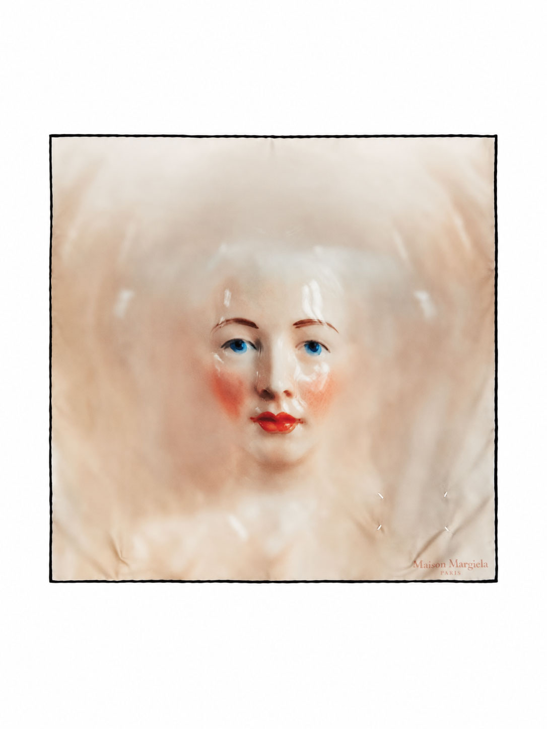 Maison Margiela Silk Scarf Porcelain Doll Print 45X45 in Blush shown flat, featuring a blurred porcelain doll portrait, contrast border and logo detail.