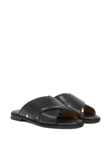 Tabi Numbers Crossed Sandal in Black black calf leather sandal with crossover strap, silver-tone hardware and split toe, diagonal front view – Maison Margiela