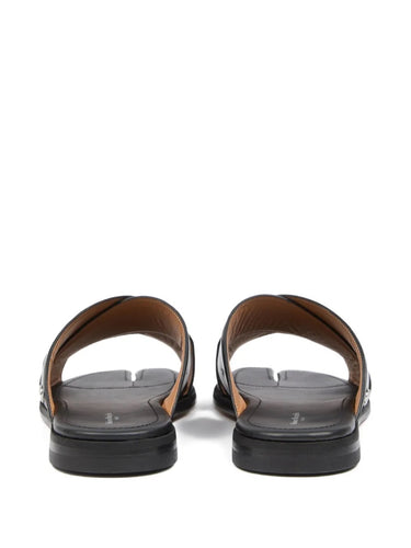 Tabi Numbers Crossed Sandal in Black black calf leather flat sandal with crossover strap and split toe, back view – Maison Margiela