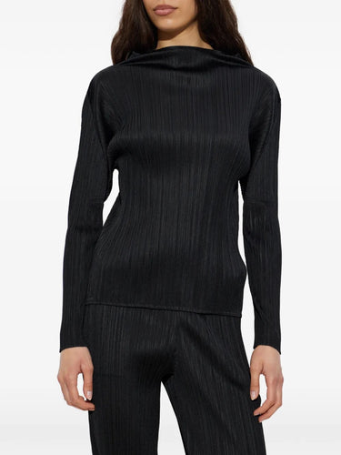 Pleats Please Issey Miyake Mock Neck Long Sleeve Shirt Black - close-up showing mock neck and pleated texture 