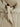 Pleats Please Issey Miyake leaf top greige detail of side tie and pleats