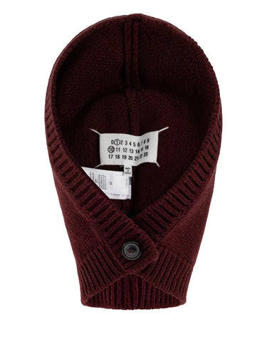 Front packshot of the Maison Margiela Beanie in Burgundy, showing the ribbed knit texture, button balaclava style, and signature Four Stitch detail.