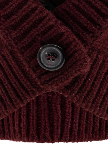 Close-up packshot of the button detail on the Maison Margiela Beanie in Burgundy, emphasizing the functional balaclava closure and Four Stitch branding.