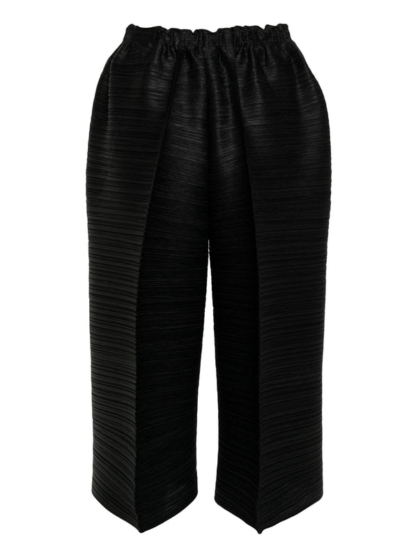 Pleats Please Issey Miyake - cropped bounce pleat pants in black - 2