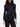 Model wearing the black pleated mock neck top with long sleeves from Pleats Please Issey Miyake on a white background