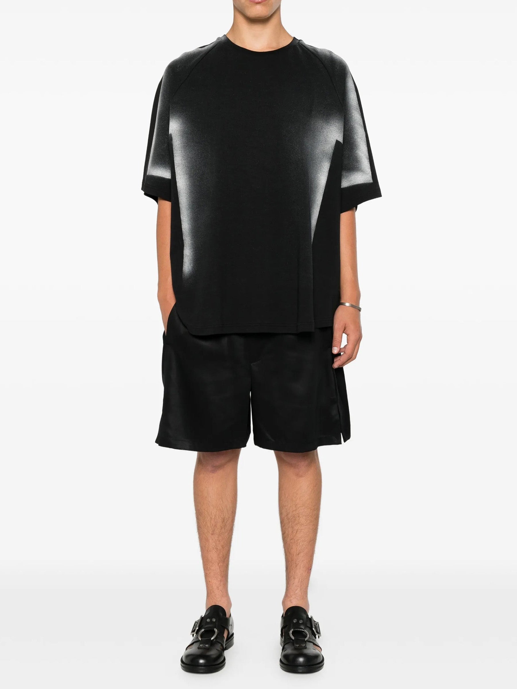 House Of The Very Islands Rae T-Shirt in Black Iridescent Print - full length front view on model showing oversized fit and iridescent print