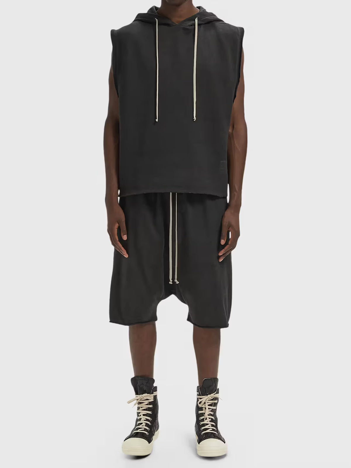 Rick Owens DRKSHDW Hooded Tunic in Faded Black worn on model, showing the relaxed straight silhouette and contrasting hood drawcords.