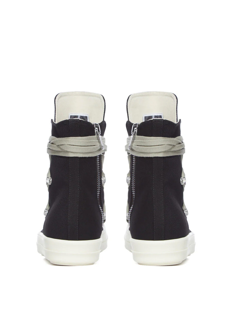 Back view of Rick Owens DRKSHDW Megalace Sneaks in Black Overdyed Denim with high-top silhouette, wraparound laces around the ankle and contrasting milk white sole