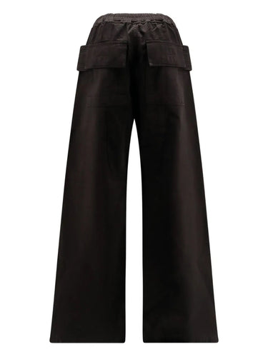 Black wide-leg pants with flap pockets on a white background
