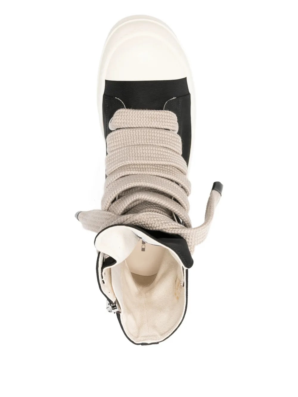 Top view of black high-top sneakers with jumbo laces from Rick Owens on a white background