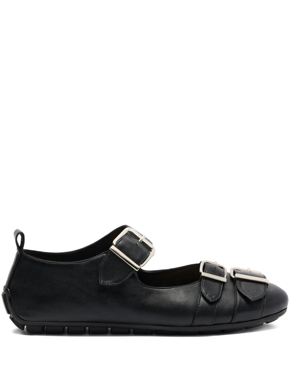 Black leather shoe with silver buckles on a white background