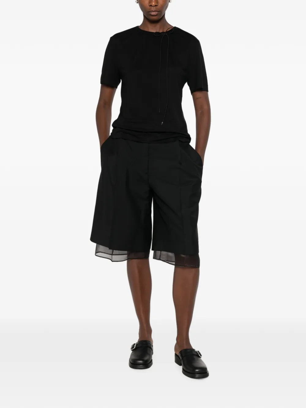Model wearing Simone Rocha Cord Neck Easy T-Shirt in black with short sleeves, relaxed fit and soft jersey drape