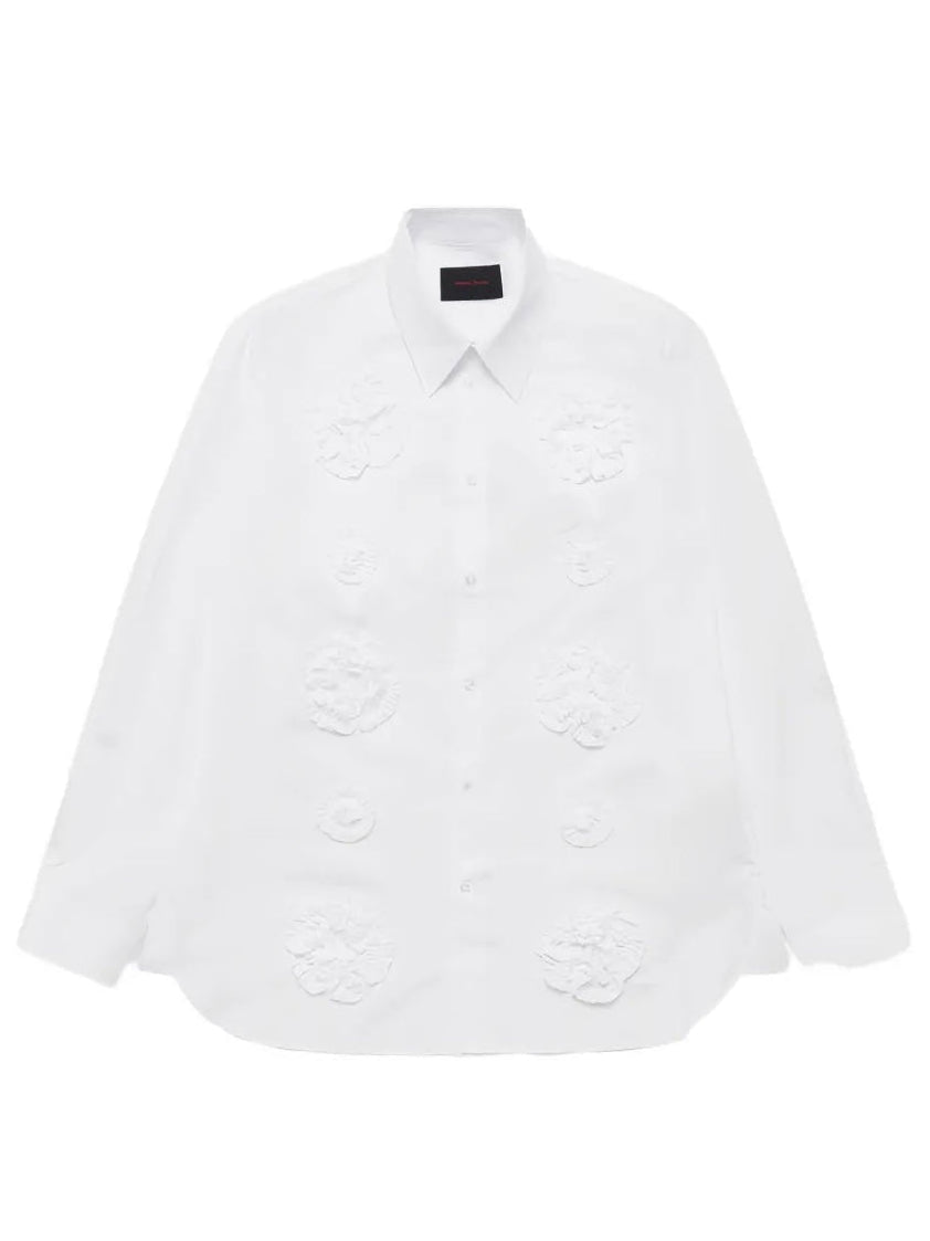 Front view of a white shirt with flower frill details from Simone Rocha on a white background
