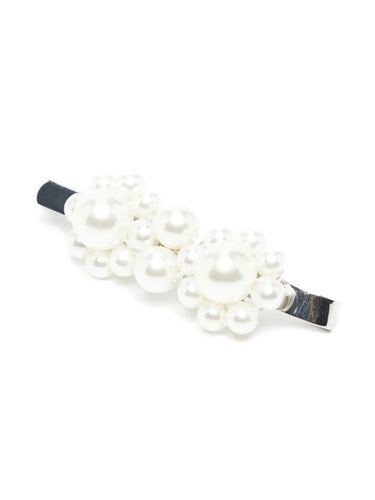 Pearl hair clip on a white background