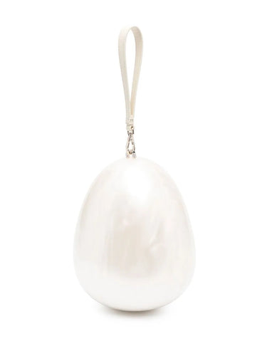 The white egg-shaped bag without the pearl cross-body strap
