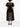 Black sheer dress with puffed sleeves on a white background