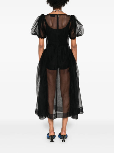 Black sheer dress with puffed sleeves on a white background