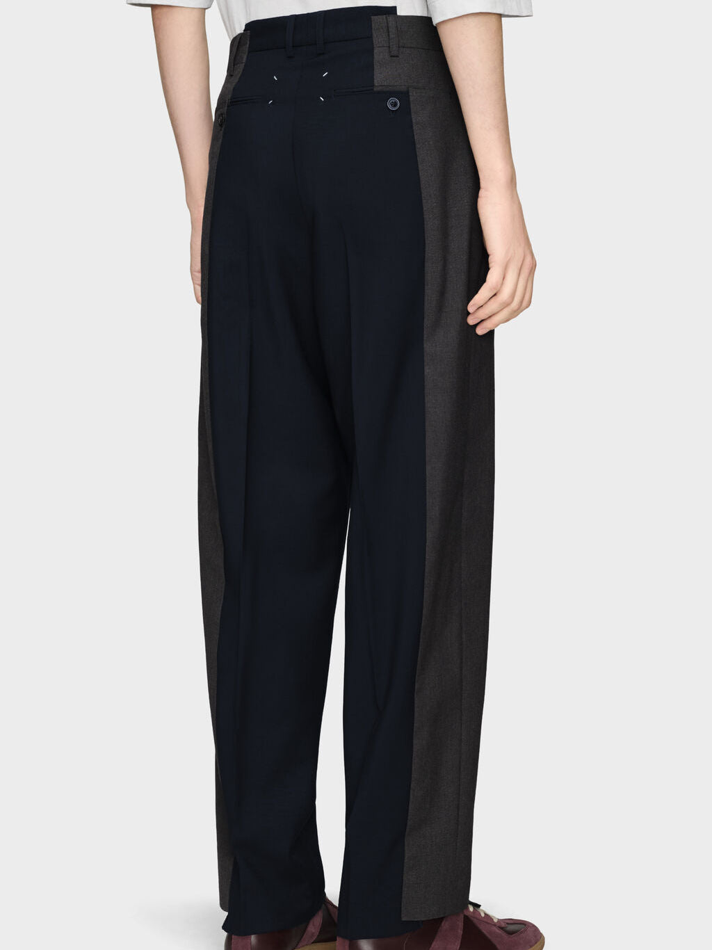 Back view of Maison Margiela Spliced Tailored Trousers in Dark Blue/Charcoal