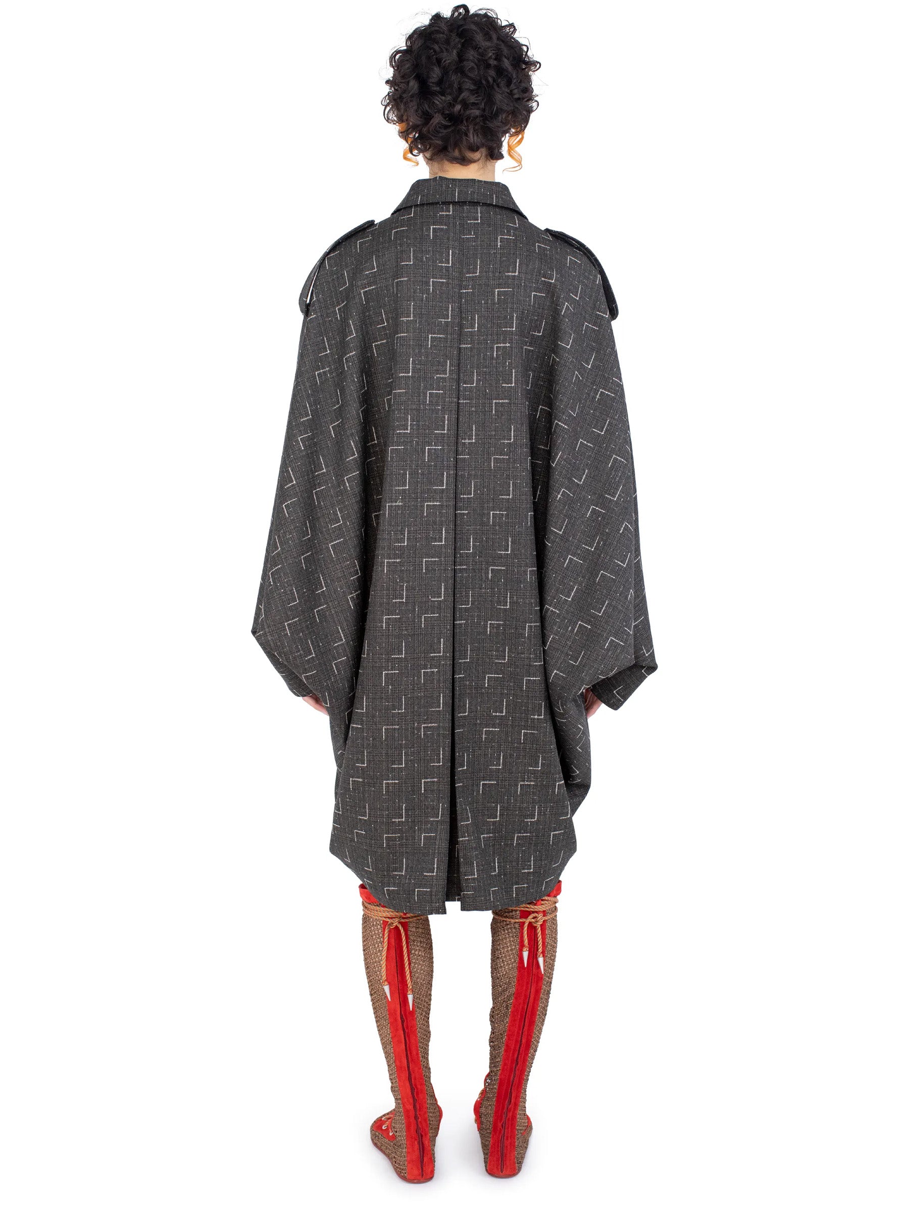Back view of the Kiko Kostadinov Statsinger Coat in Off Black & Chalk.