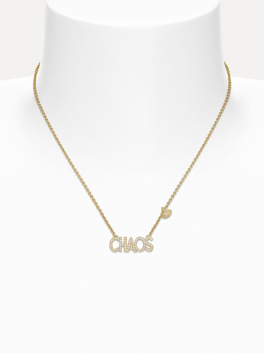 Vivienne Westwood Chaos Pendant in Gold displayed on a necklace form, showing the crystal CHAOS pendant and delicate gold-tone chain.