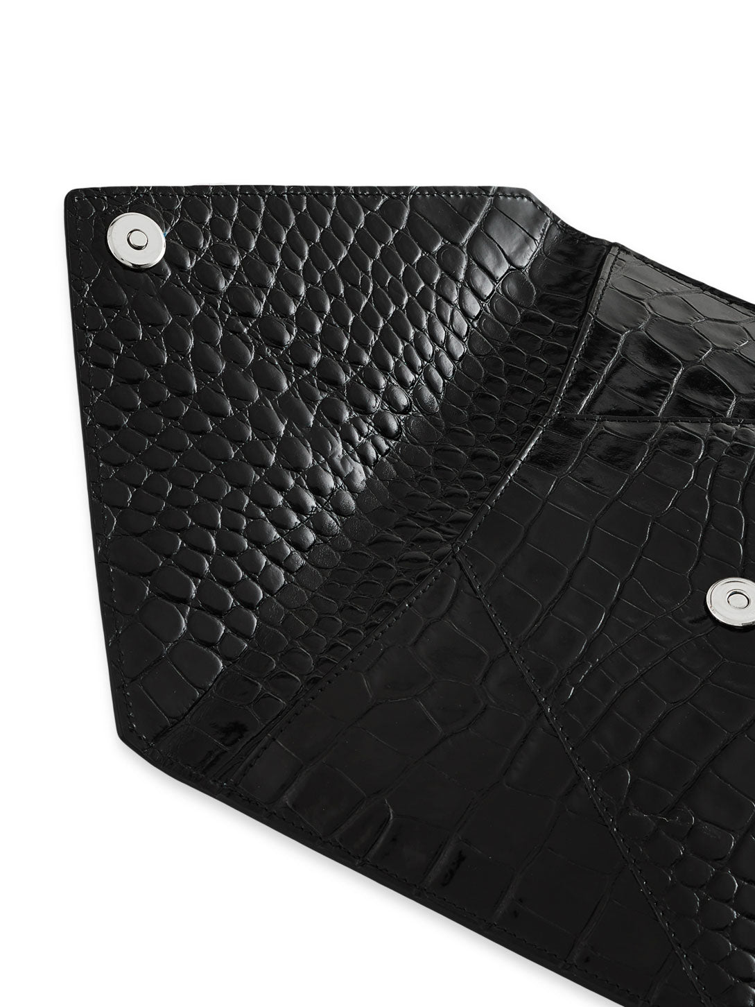 Open Vivienne Westwood Envelope Clutch in black showing magnetic snap fastening, crocodile-effect interior and card slots.