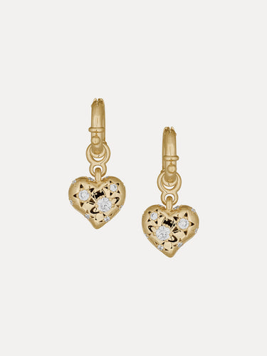 Gold heart-shaped earrings with diamond accents on a white background