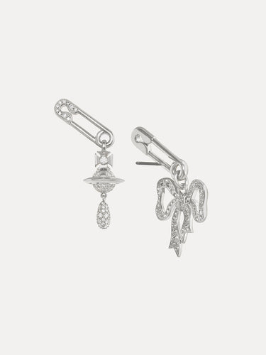 Back view of the silver earrings with bow and orb design from Vivienne Westwood on a light grey background