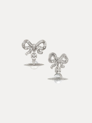Pair of silver bow-shaped earrings on a white background