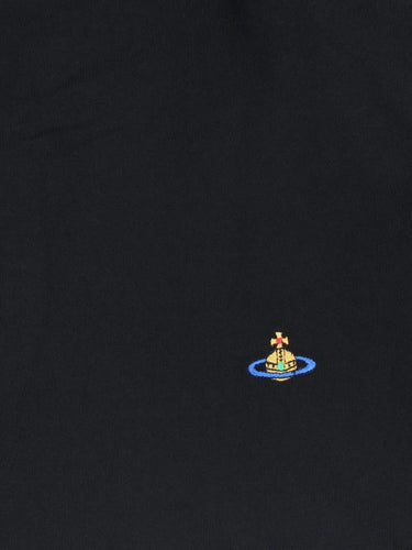 Pamela Jumper in Black by Vivienne Westwood, closeup of signature multicolour Orb logo embroidery on black cotton knit, Spring/Summer 2026