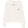 Pamela Jumper in Cream by Vivienne Westwood, front view of relaxed-fit cream cotton jumper with softly draped cowl neckline, long sleeves, ribbed cuffs and hem, and multicolour Orb logo embroidery at chest, Spring/Summer 2026