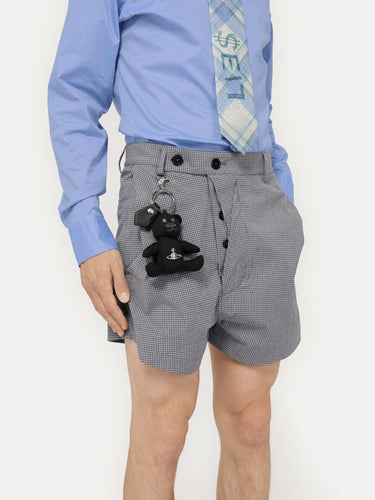 A person wearing the black teddy bear keychain from Vivienne Westwood on his belt loop.