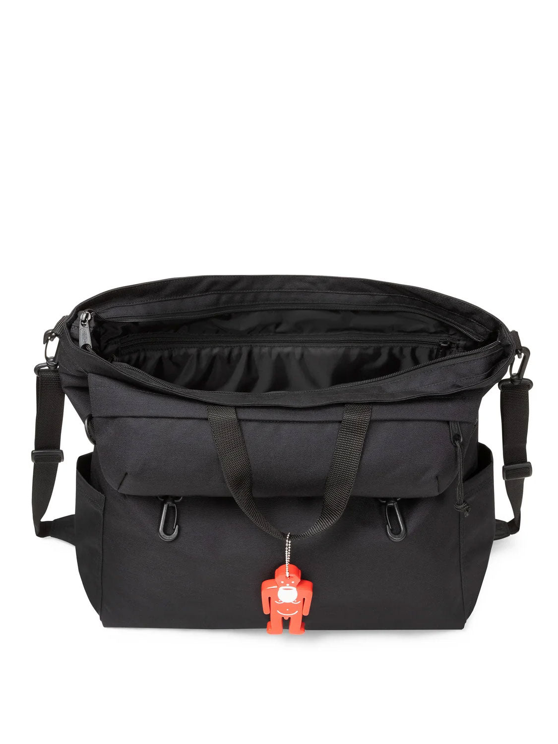 Walter Van Beirendonck x Eastpak Walter Carry Bag in Black shown open, revealing the main compartment and internal zip pocket