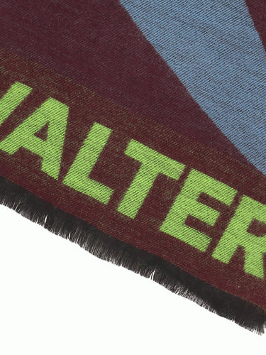 Close-up of the bordeaux scarf with alien illustration by Walter Van Beirendonck
