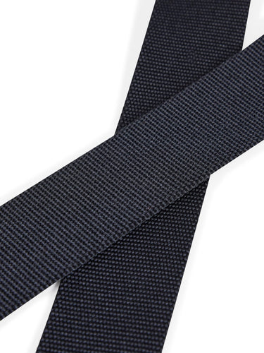 Detail close-up of the Y-3 Classic Logo Belt in Black, emphasizing the buckle connection and embossed Y-3 branding.