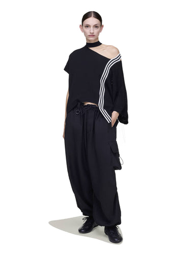 Front view of a female model wearing the Y-3 Knit Top in Black, showing the relaxed fit, soft knit texture, and modern silhouette.