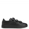 Side packshot of the Y-3 Stan Smith Hook-and-Loop Shoes in Black, showing the black leather upper, hook-and-loop strap closure, and perforated 3-Stripes.