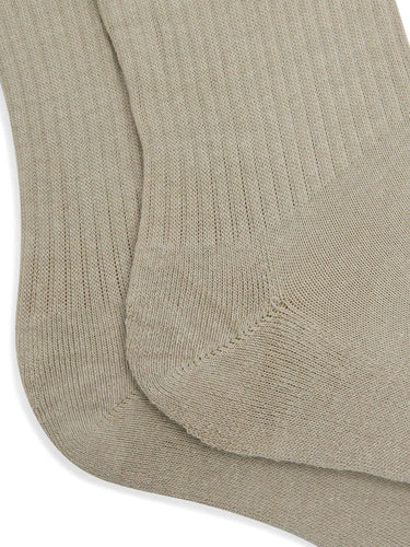 Close-up of the top cuff and knit fabric of the Y-3 Stripes High Socks in Light Brown, showing the engineered 3-Stripes and embroidered Y-3 logo.