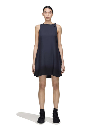 Female model wearing the Women’s Shirt Double-Dye Dress in night grey and black from Y-3, shown from the front with a loose, short silhouette.